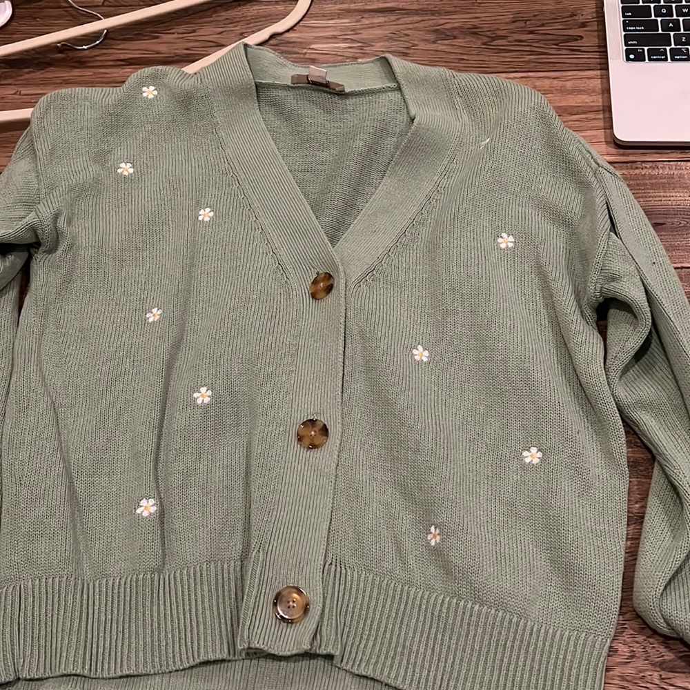 Green sweater with flowers